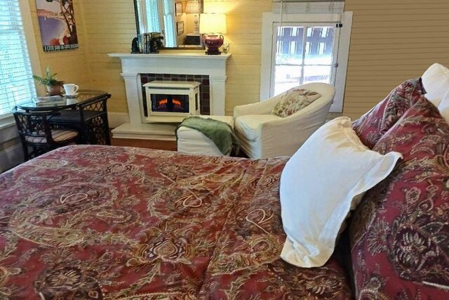 Queen bed and romantic radiant heat log store