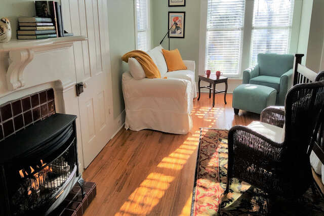 Spacious living area with gas log fireplace