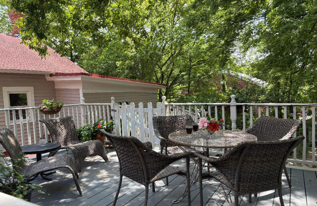 Private gated balcony with garden view