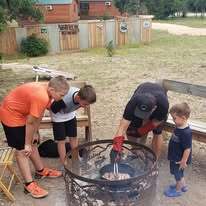 RV site in Boerne, TX, offering a pool, shaded picnic areas, and recreational activities for the whole family.