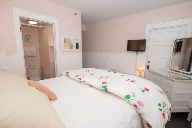 Queen Bed, TV, 1911 Dresser