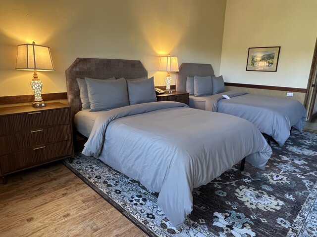 Room shown with 2 Full Beds