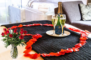 Image 1 for Indulgent Arrival - French Champagne/12 Roses