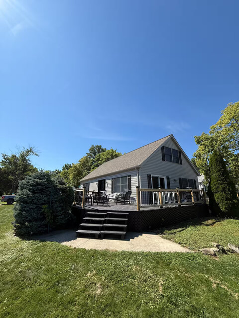 Image 1 for Lakefront Lodge | Sleeps 12 | Bay Views + Hot Tub