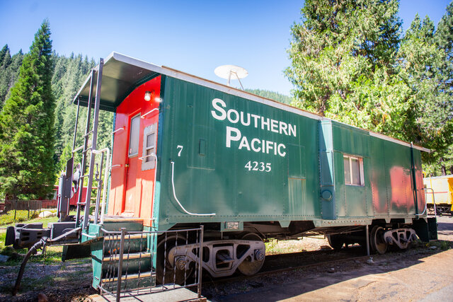 Image 1 for 07) Caboose #7 (2 Full Beds) - Green & Orange Caboose