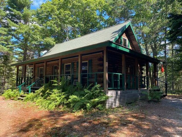 Image 1 for Off-Site Wooded Cabin 64 | Sleeps 8