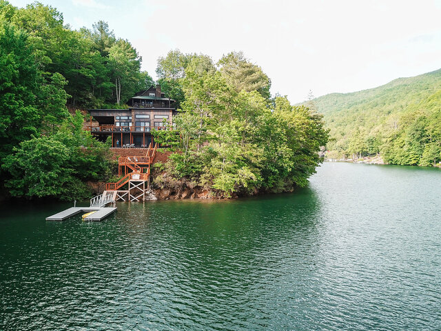 Natural shoreline and clear lake water just steps away