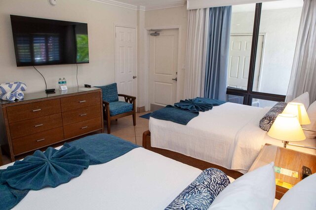 Image 2 for RM 16 2FL  Hotel Room Street-side w 2 Queen Beds No Balcony