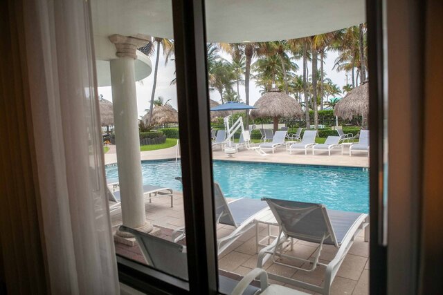 Image 1 for RM 07 Hotel Room Poolside King Bed