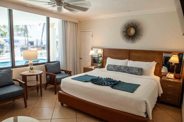 Image 1 for RM 05 Efficiency Poolside King Bed & Queen Sleeper Sofa