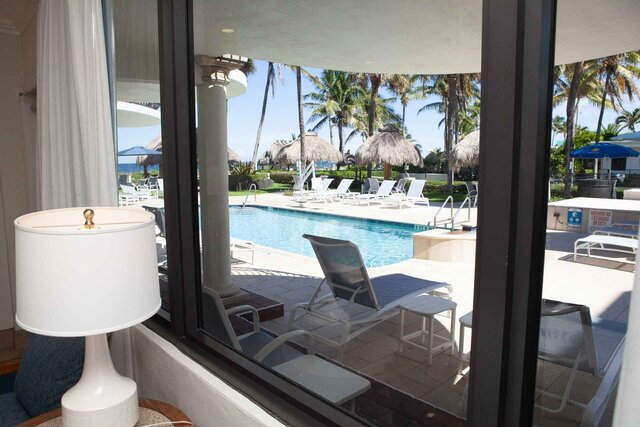 Image 1 for RM 09 Efficiency Poolside King Bed & Queen Sleeper Sofa