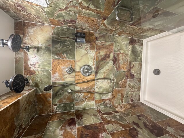 Double Shower Heads plus handheld